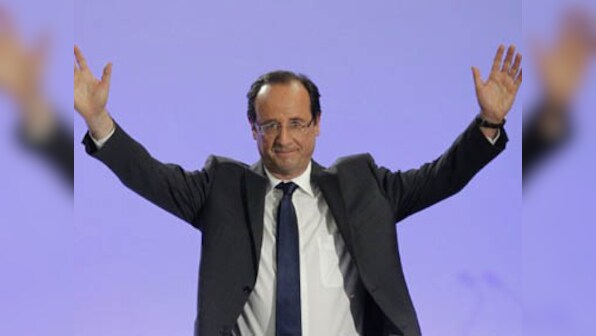In response to 'army of fanatics', Hollande vows 'more songs, concerts and shows'