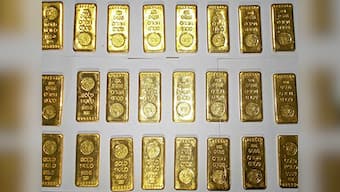 Gold edges up after a sharp drop in the previous session as US warning heightens coronavirus concerns