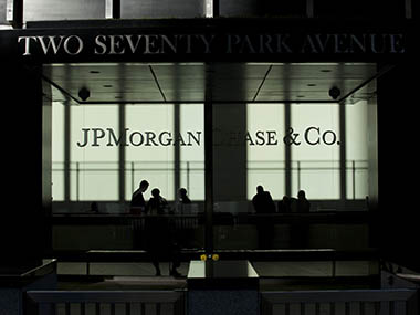 JPMorgan's legal troubles weigh on employee pay JPMorgan's legal troubles weigh on employee pay