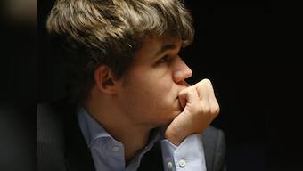 Carlsen prepares for Anand showdown by playing badminton, tennis