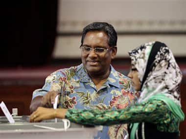 The President of Maldives casts his vote: AP
