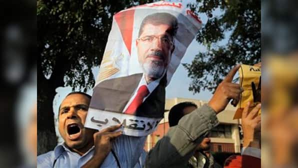 Egyptian court sentences 20 people to death for killing 13 policemen in 2013 coup