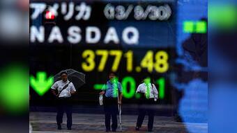 Asia shares shattered by worst Wall Street rout in eight months; China's yuan under fire