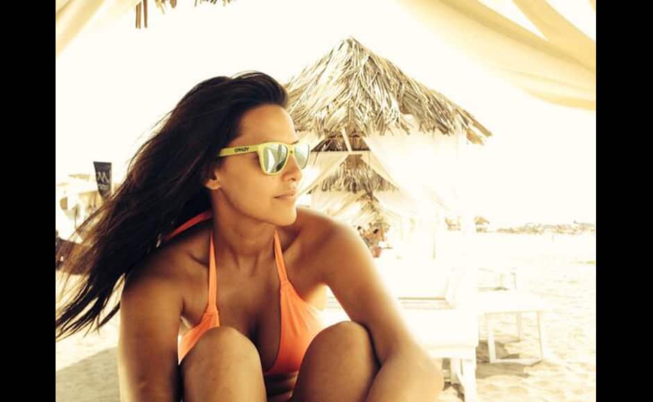 This is one of Neha Dhupia's rare selfies. But she's made it count - Goa in the background, the classiv selfie sideways pose - as if the camera has just somehw snuck up on the subject in a candid moment of natural beauty - and the dull yellow tones of the photo itself. Ms. Dhupia knows what she's doing. 