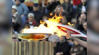 Olympic torch set for space as Russia struggles to keep it burning