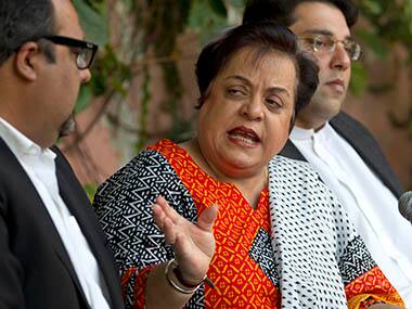 Shireen Mazari, center, information secretary of the Pakistan Tehreek-e-Insaf party, addresses a news conference with party officials in Islamabad, Pakistan, Wednesday, Nov. 27, 2013. A political party opposed to U.S. drone attacks in Pakistan revealed what it said was the name of the top CIA spy in the country on Wednesday and called for him and the head of the agency to be tried for a recent missile strike. Pakistani police and intelligence officials have said the attack on an Islamic seminary in Khyber Pakhtunkhwa's Hangu district on Nov. 21 killed five people. AP