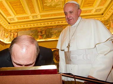 Putin shows faith, kisses Madonna icon at Vatican -World News , Firstpost