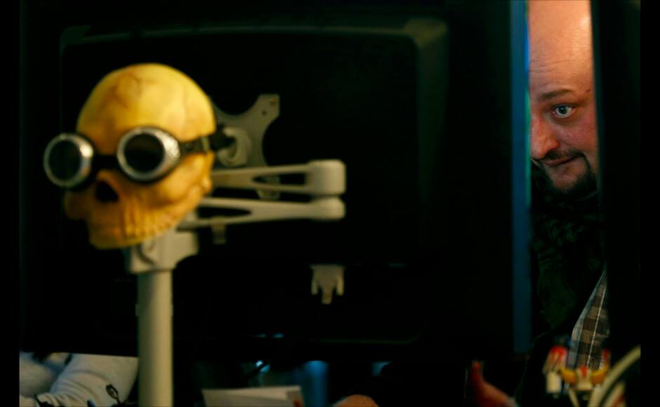 Millenium graphic designer Philippe looks at a computer screen inside the Millenium Gaming House in Marseille November 12, 2013. The Millenium Gaming House, which opened its doors in Marseille in 2011, is the most important French e-sport organization and houses pro gamers who live, game, eat and sleep full-time in the building. The house is dedicated to the training of Pro Gamers teams for International competitions. Players train long hours to master the difficulties and subtleties of only one game and participate in Lan-Parties around the world. E-Sports earnings has ranked the 100 players with the highest overall earnings from competitive gaming, with over 60 gamers who have earned over $100,000 in prize money. Picture taken November 12, 2013. REUTERS/Jean-Paul Pelissier 