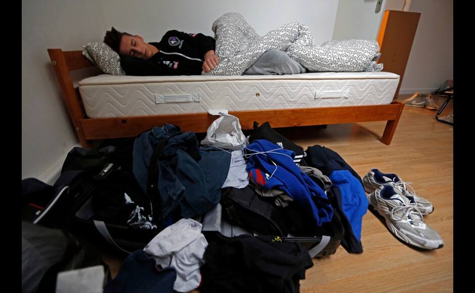 Millenium eSport professionnal gamer Johann of France, nicknamed Maniika, sleeps in his room inside the kitchen of the Millenium Gaming House in Marseille November 12, 2013. The Millenium Gaming House, which opened its doors in Marseille in 2011, is the most important French e-sport organization and houses pro gamers who live, game, eat and sleep full-time in the building. The house is dedicated to the training of Pro Gamers teams for International competitions. Players train long hours to master the difficulties and subtleties of only one game and participate in Lan-Parties around the world. E-Sports earnings has ranked the 100 players with the highest overall earnings from competitive gaming, with over 60 gamers who have earned over $100,000 in prize money. Picture taken November 12, 2013. REUTERS/Jean-Paul Pelissier 