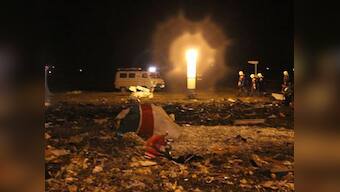 Russian investigators comb debris to find why plane crashed