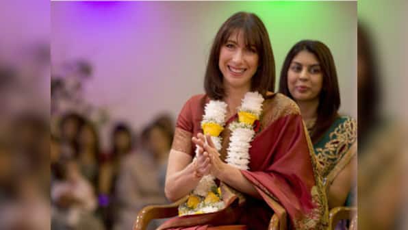 She pleats to conquer: Samantha Cameron's sari triumph