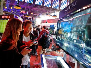 PlayStation fans go hands on at the PlayStation 4 launch event. AP