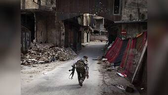Syrian troops regain two rebel held towns in Homs