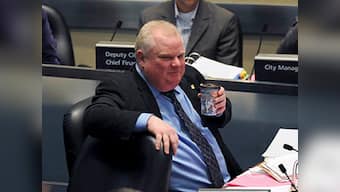 Toronto council strips Mayor Rob Ford of powers over drug, drinking habits
