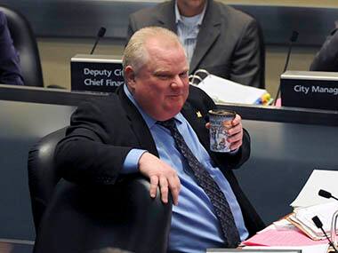 Toronto council strips Mayor Rob Ford of powers over drug, drinking habits