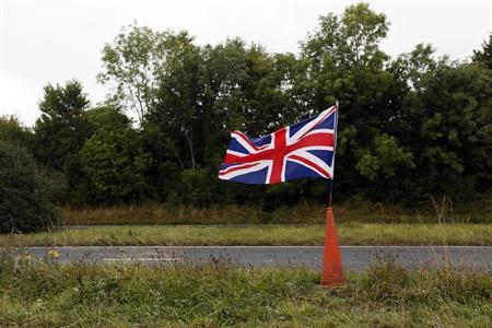 Britain scraps immigration bond plan after outcry, coalition split Britain scraps immigration bond plan after outcry, coalition split