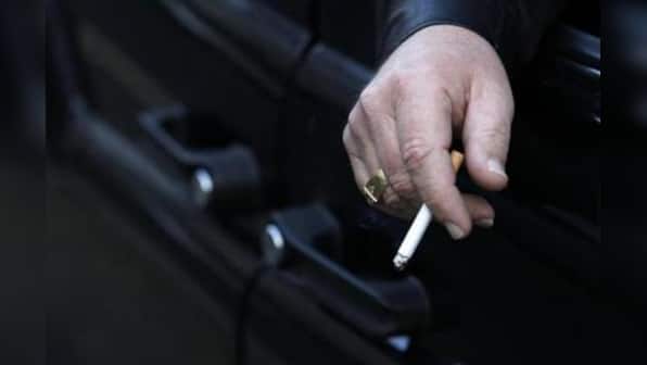 Britain seeks to force plain cigarette packaging on tobacco firms