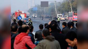 China: 1 killed, 8 injured in blasts outside Communist Party office 