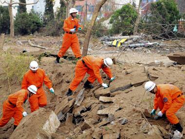 China explosion: Looking for survivors. AP