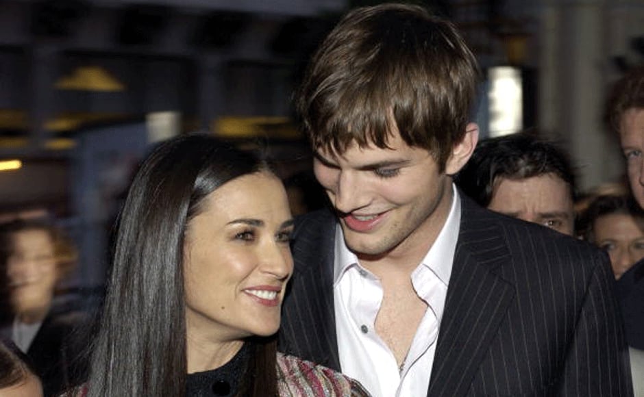 Ashton Kutcher and Demi Moore at the Mann's Chinese Theatre in Hollywood, California (Photo by Lester Cohen/WireImage) 