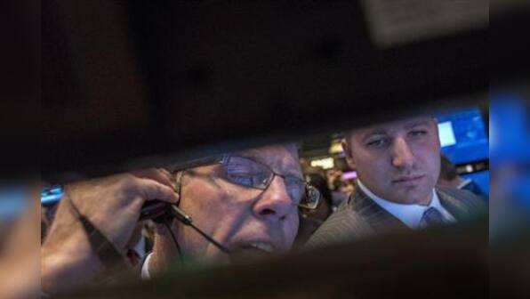 Results, manufacturing data buoys Wall Street