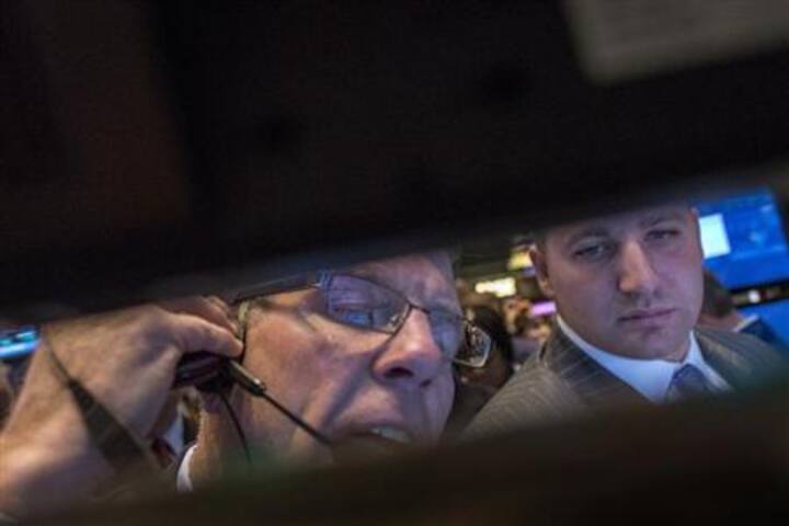 Results, manufacturing data buoys Wall Street