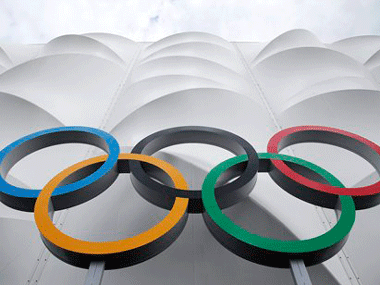 Russia to take Olympic torch on first ever space walk Russia to take Olympic torch on first ever space walk