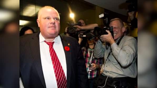 Rob Ford admits to buying drugs, but won't quit as Toronto mayor