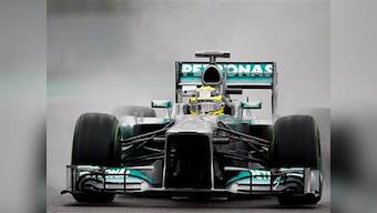 Rosberg fastest in wet Brazil practice