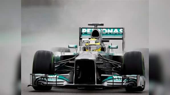 Rosberg fastest in wet Brazil practice