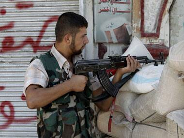 Syrian opposition group will join peace talks with government