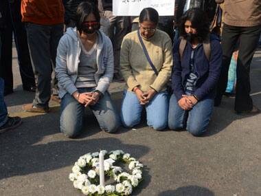 Women condole the death of the December 16, 2012 gangrape victim in Delhi. AFP.