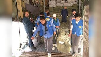 INSIGHT - Syria uses red tape, threats to control U.N. aid agencies