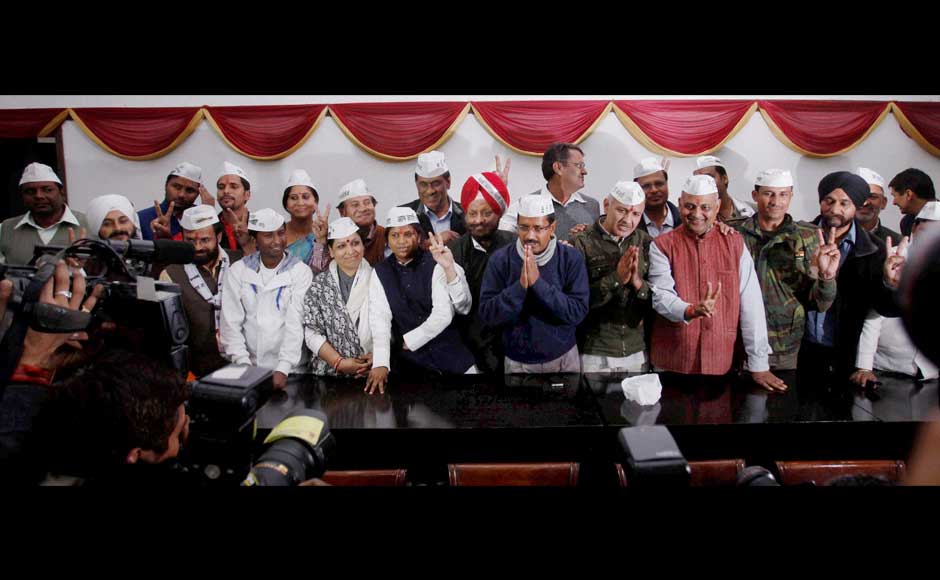 Aam Aadmi Party convener Arvind Kejriwal with Manish Sisodia and the party's 26 elected candidates during a meeting in New Delhi on Monday.PTI Aam Aadmi Party convener Arvind Kejriwal with Manish Sisodia and the party's 26 elected candidates during a meeting in New Delhi on Monday.PTI