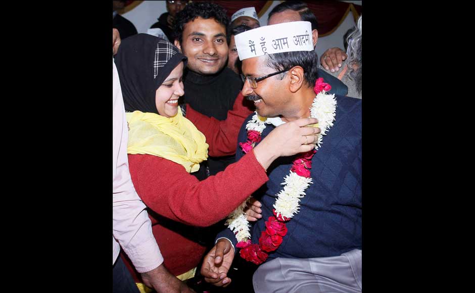 Aam Aadmi Party convener Arvind Kejriwal being garlanded by a party worker after he was elected unanimously by 27 legislators of the Aam Aadmi Party as their leader in the Delhi Assembly, in New Delhi on Monday. PTI Aam Aadmi Party convener Arvind Kejriwal being garlanded by a party worker after he was elected unanimously by 27 legislators of the Aam Aadmi Party as their leader in the Delhi Assembly, in New Delhi on Monday. PTI