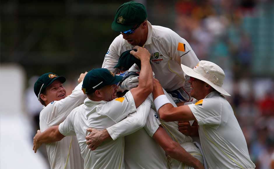 Australia's team celebrates after winning the third Ashes test cricket match against England at the WACA ground in Perth December 17, 2013. Australia beat England by 150 runs in the third test at the WACA on Tuesday to take an unassailable 3-0 lead in the five-match series and reclaim the Ashes. REUTERS