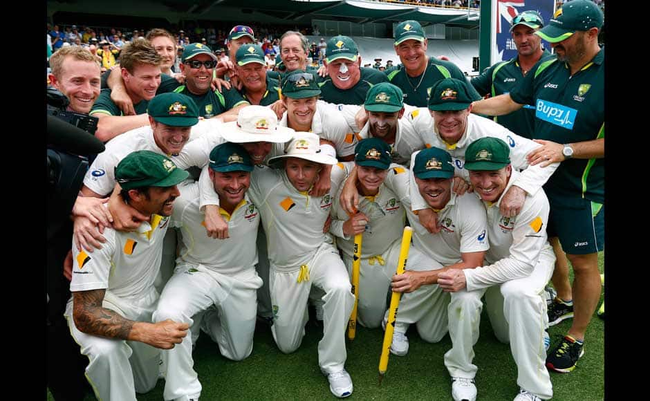 The Australian team pose for group photo after winning their Ashes cricket test match over England,Tuesday, Dec. 17, 2013, in Perth, Australia. Australia won the match by runs and take an unbeatable 3-0 lead in the five game series. AP