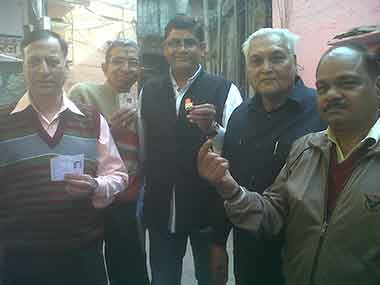President of the Chandini Chowk RWA (middle) with residents. Firstpost/Pallavi Polanki