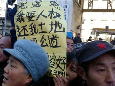 Residents protest demolition of homes by drinking pesticide in Beijing Residents protest demolition of homes by drinking pesticide in Beijing