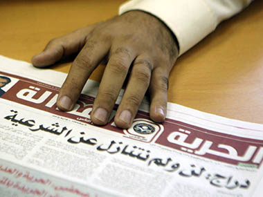 Four of Al Jazeera's journalists held in Egypt after hotel broadcast Four of Al Jazeera's journalists held in Egypt after hotel broadcast