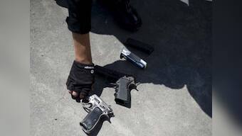 Cops seize huge cache of arms, nab two smugglers