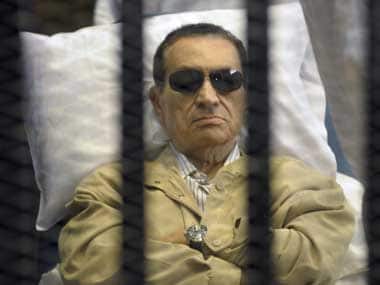 Egypt's ex-PM, Mubarak's sons acquitted by court of corruption charges