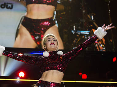 Miley Cyrus makes underwear top prop in new music video Miley Cyrus makes underwear top prop in new music video