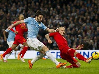 Liverpool's Skrtel tackles Negredo. AP