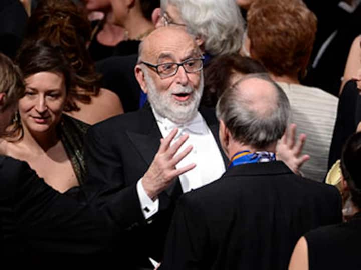 Nobel awards ceremony held with many VIPs away for Mandela memorial