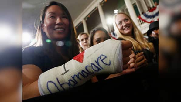 Don't be discouraged by rocky healthcare rollout, Obama tells Americans