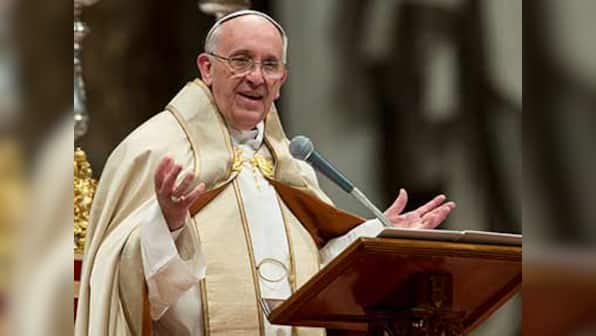 Pope Francis visits typhoon-hit Philippine city to console survivors