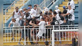 Photos: Rival soccer fans in in bloody clash in Brazil 