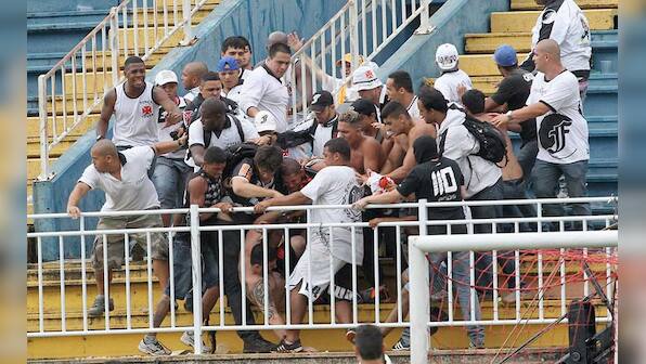 Photos: Rival soccer fans in in bloody clash in Brazil 