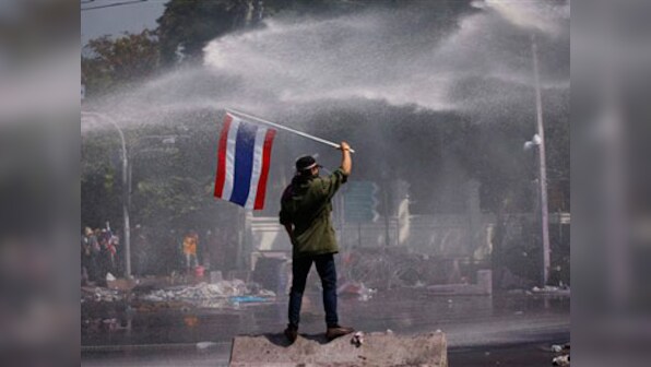 Thai protesters find new govt targets, maintain pressure to cancel elections 
